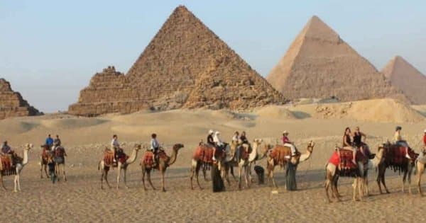 Half Day Tours of the Pyramids of Giza and Sphinx with Camel Riding and Guide